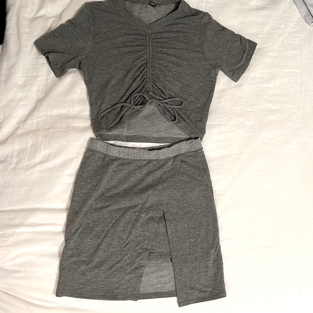 Super soft wrapped skirt and cinch top in dark Heather. Looks brand new!